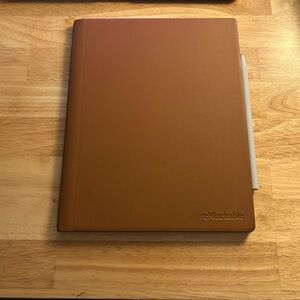 reMarkable 2 tablet with marker + premium leather folio + USB charger cable